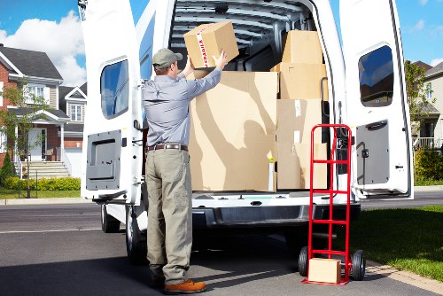 Team using proper lifting techniques with moving equipment
