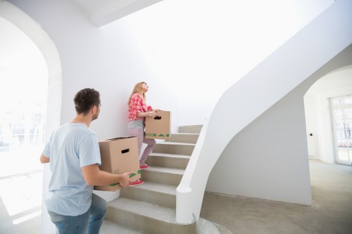 Boxes and furniture being loaded from a London apartment