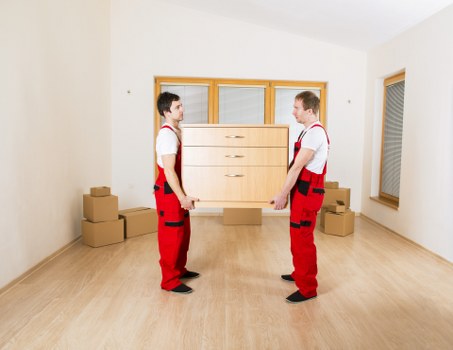 Careful loading of household items for a local flat move in Belsize Park